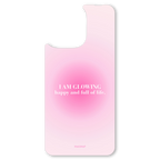 The I AM GLOWING interchangeable magnetic backplate is displayed on an iPhone 15.